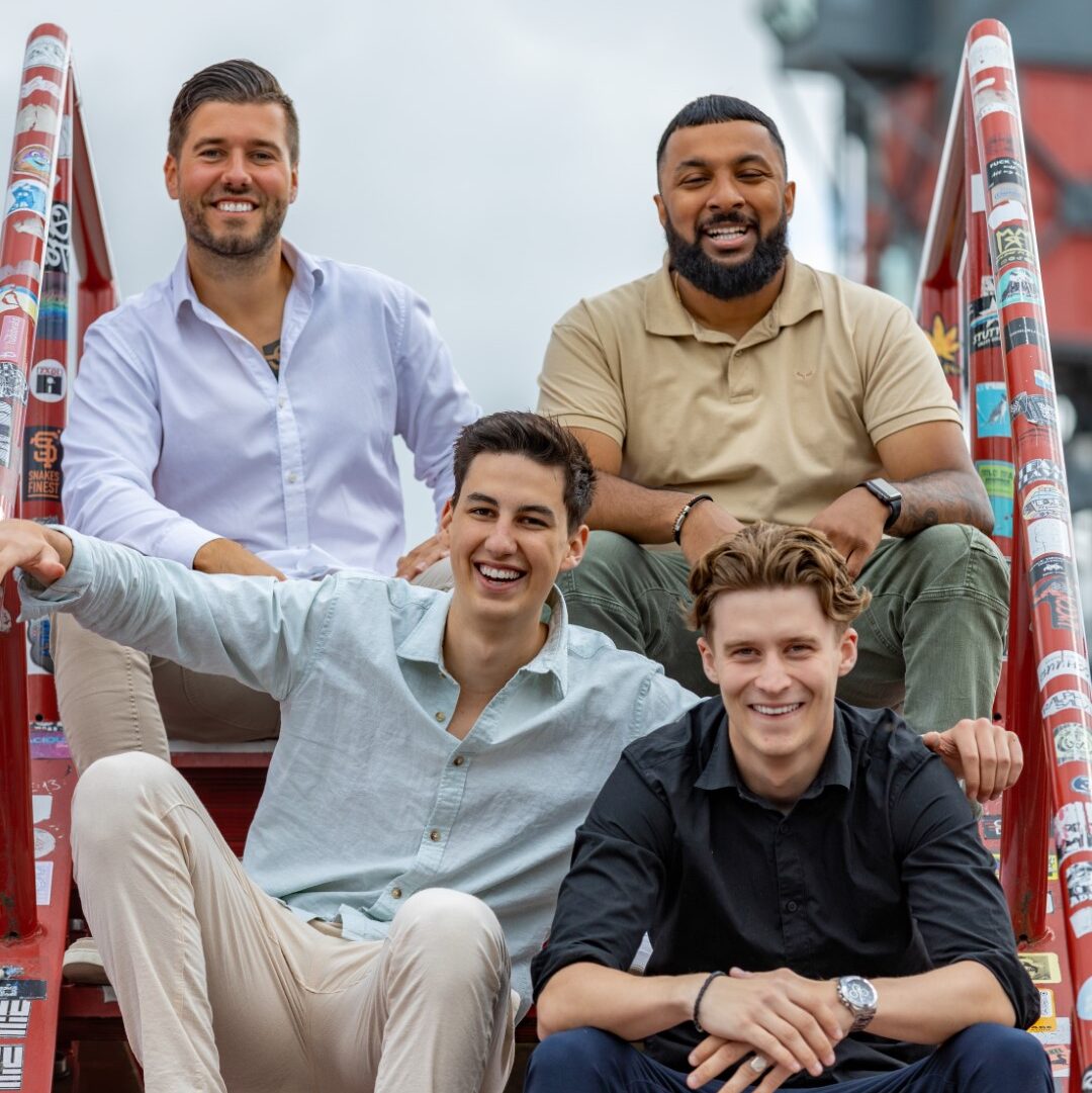 VitalSelect Team on the stairs.